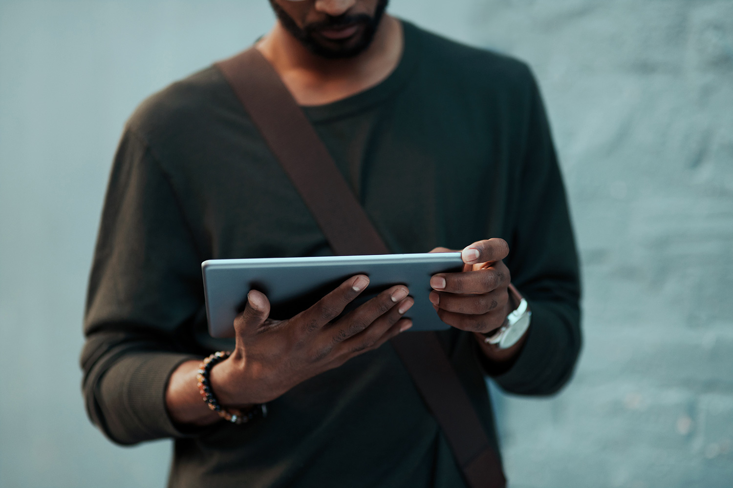 Purchased Image - Male Face Obscured On Tablet Device